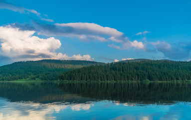 landscape with mountain lake and clouds