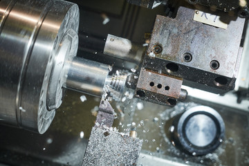 turning cnc machine at metal work industry. Multitool precision manufacturing and machining