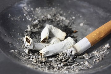 cigarette in ashtray