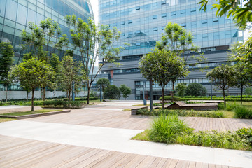 Public areas between office buildings, with some trees planted