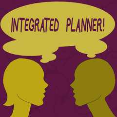 Text sign showing Integrated Planner. Business photo showcasing translating desired business outcomes into financial Silhouette Sideview Profile Image of Man and Woman with Shared Thought Bubble