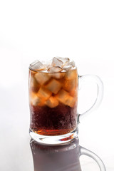 Coke and ice in a glass