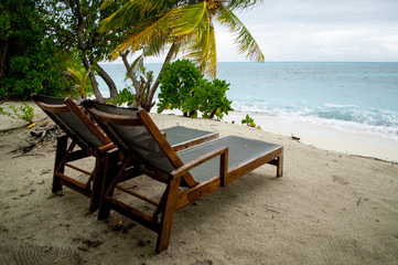 Obraz na płótnie Canvas chair on the beach