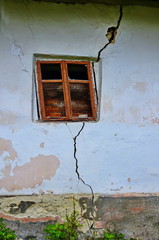 Damage of buildings by seismic blows.
