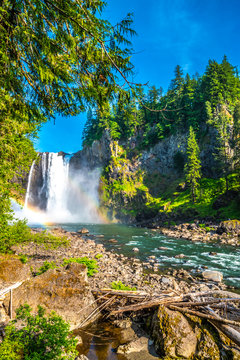 Clear Skies And Double Rainbow Over Snoqualmie Falls In Washington