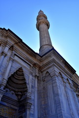 Fototapeta na wymiar View of minaret at Nuruosmaniye Mosque in Istanbul, Turkey