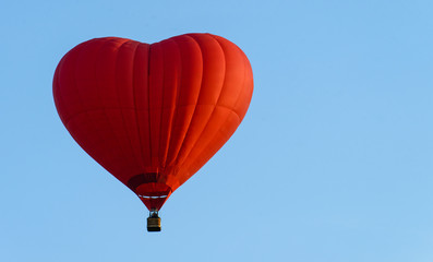 balloon heart on blue sky background symbol of love and romance