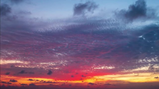 Time lapse video video Scene of Colorful sunset with Moving clouds background in nature and travel concept.
