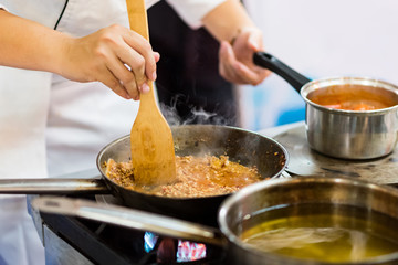 Chef preparing food in the kitchen, chef cooking