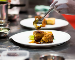 Chef preparing food in the kitchen, chef cooking