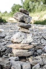  stone tower on a mountain river
