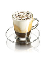 Espresso, stained with cold milk, served in a glass mug, isolated on a white background
