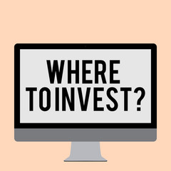 Word writing text Where To Invest question. Business photo showcasing asking about actions or process of making more money Blank White Computer Monitor WideScreen Mounted on a Stand for Technology