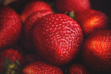Red Strawberry on the dark background