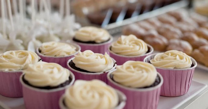 Cute candy bar with various cakes and candies. Wedding candybar.