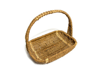 a brown wicker basket of wood vines on a white background