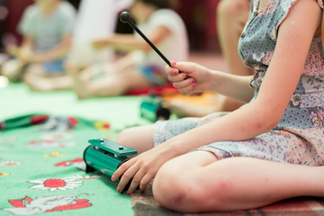 Baby girl playing a musical instrument Resonator Bells