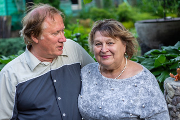 Mature couple resting in the Park