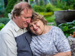 Obraz premium Mature couple resting in the Park