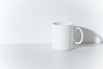 white glass coffee cup mug ceramic with wall room background table minimal