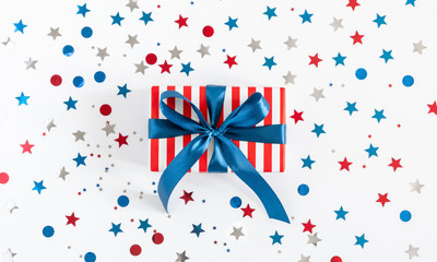 Obraz premium 4th of July American Independence Day. Happy Independence Day, decorations on white background. Flat lay, top view, copy space