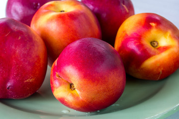 Fototapeta na wymiar fresh tasty peach on a white background