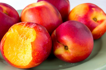 Fototapeta na wymiar fresh tasty peach on a white background