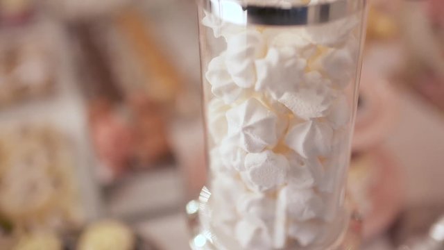 Cute candy bar with various cakes and candies. Wedding candybar.
