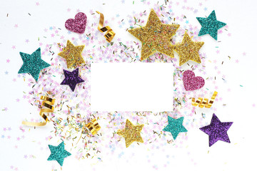 Obraz premium Blank for a postcard with multi-colored stars, serpentine, glitter. Space for text...