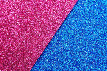 Abstract background of pink and blue glitter cardboard diagonally. Concept versus...