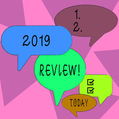 Word writing text 2019 Review. Business photo showcasing remembering past year events main actions or good shows Many Color Speech Bubble in Different Sizes and Shade for Group Discussion