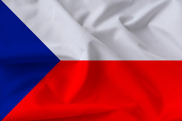 beautiful national flag of the Czech Republic on soft silk with soft folds close-up