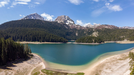 Natural landscape. Mountain lake. Aerial view on Black lake in National park Durmitor. Montenegro.