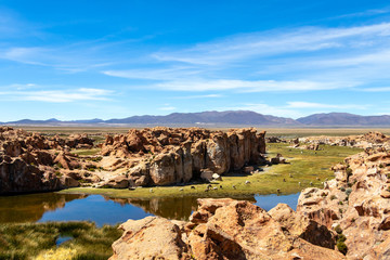 Fototapeta na wymiar View of the Laguna Negra, Black lagoon Lake wedged between rock formations in Altiplano, Bolivia