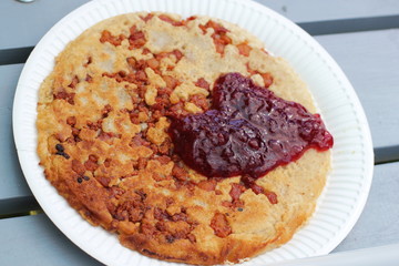 Traditional Swedish dish Kolbulle with lingonberry jam