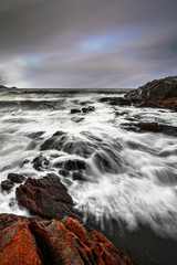 waves crashing on rocks
