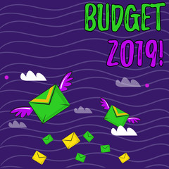 Text sign showing Budget 2019. Business photo showcasing estimate of income and expenditure for current year Many Colorful Airmail Flying Letter Envelopes and Two of Them with Wings