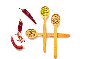 Wooden Spoon  with cereals isolated on white background. 