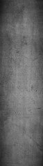 Obraz na płótnie Canvas Dunkle Betonwand mit verdunkelten Ränder und Steinstrukturen. Struktur, Textur, Hintergrund, Industrial Design, Schwarzer Hintergrund mit highlight Effekt. 16:9 Hochformat 