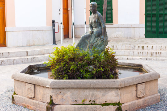 "La filadora" sculpture of  Remigia Caubet in Esporles, Mallorca, Spain