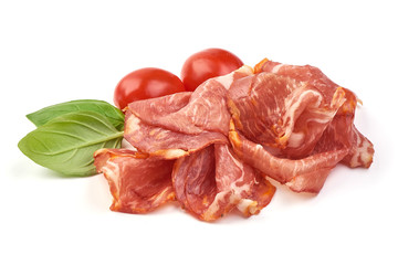 Italian prosciutto crudo or jamon, smoked meat, close-up, isolated on white background