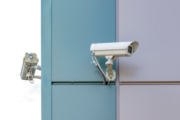 two video surveillance cameras at the end of the building