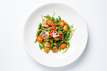 salad with baby octopus and vegetables