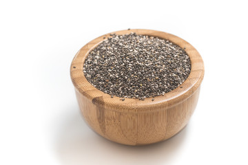 Chia seeds in a wooden bowl