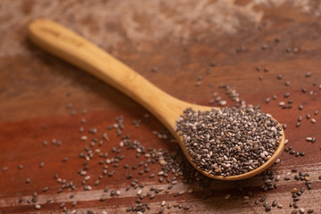 Chia seeds in a wooden spoon