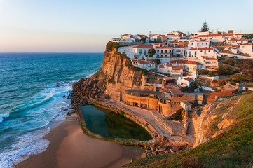 Small Portugal village Azenhas do Mar on cliff on coastline