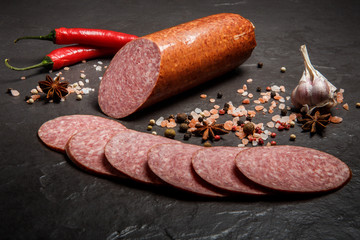 half of smoked cervelat pepperoni sausage with garlic and chili