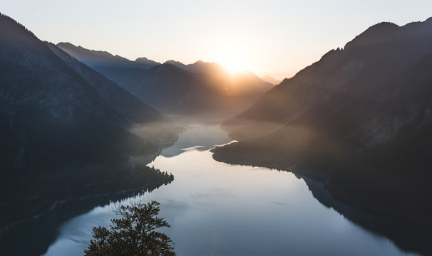 Sunrise over mountain lake in Austria