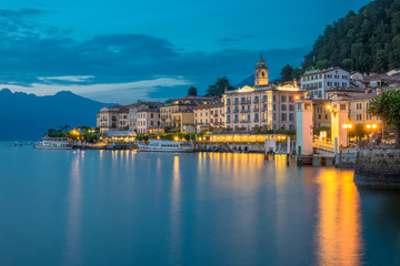 Fototapeta na wymiar Bellagio on Lake Como after the sunset with city lights
