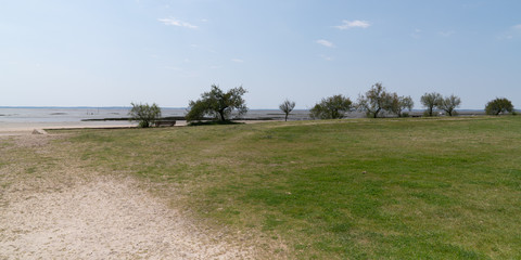 Sand beach in Arcachon bay in Andernos village in France on web banner template